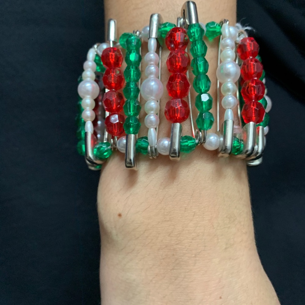 Unique beaded red,green, and white piece